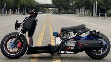 Customized Honda Ruckus scooter, highlight your disposition.